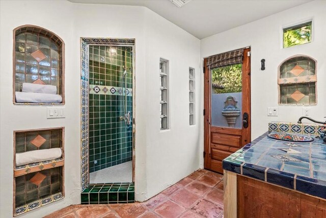 interior space with a shower and sink