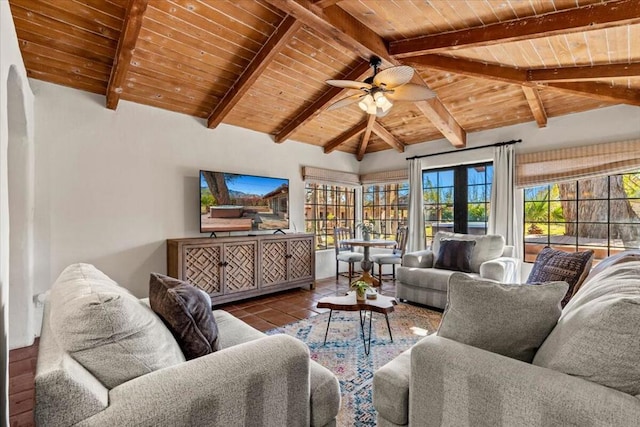 tiled living room with ceiling fan, lofted ceiling with beams, and wood ceiling