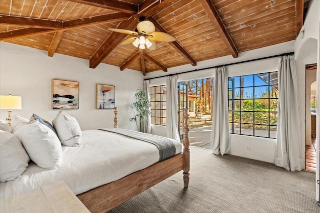 carpeted bedroom featuring ceiling fan, vaulted ceiling with beams, access to outside, and wooden ceiling