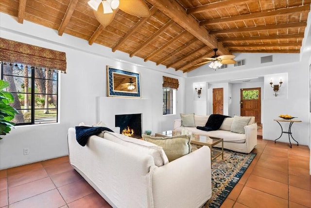 living room with wood ceiling, ceiling fan, tile patterned flooring, high vaulted ceiling, and beamed ceiling