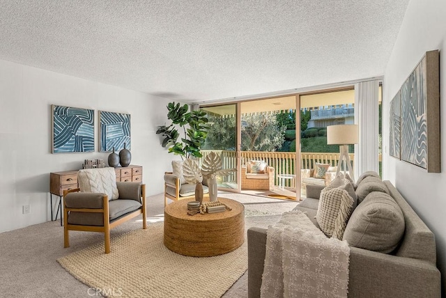 interior space with floor to ceiling windows and a textured ceiling