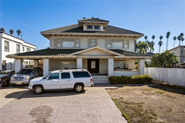 view of front facade with a carport