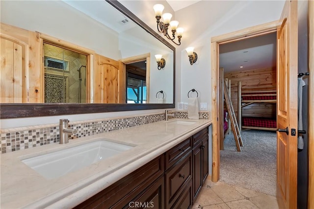 bathroom with backsplash and vanity