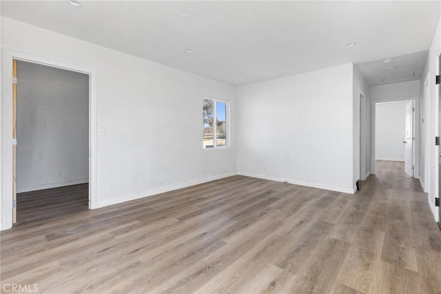 empty room featuring light hardwood / wood-style floors