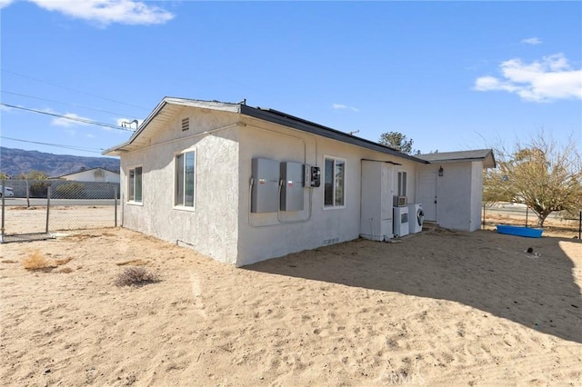 exterior space featuring washer / dryer