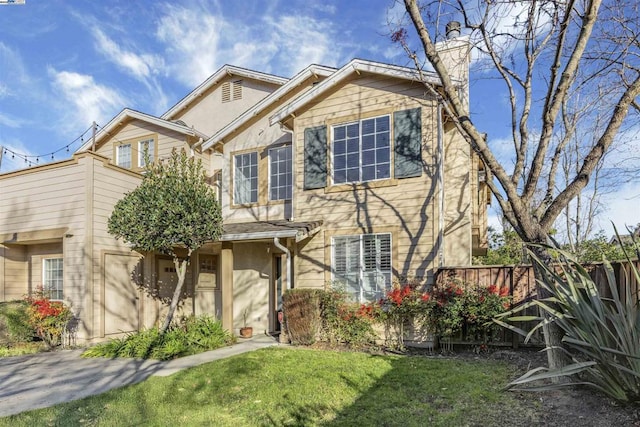 view of front of home with a front yard