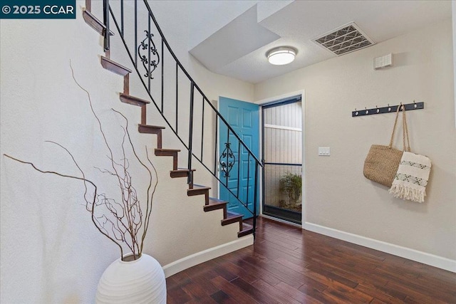 entryway featuring dark hardwood / wood-style flooring