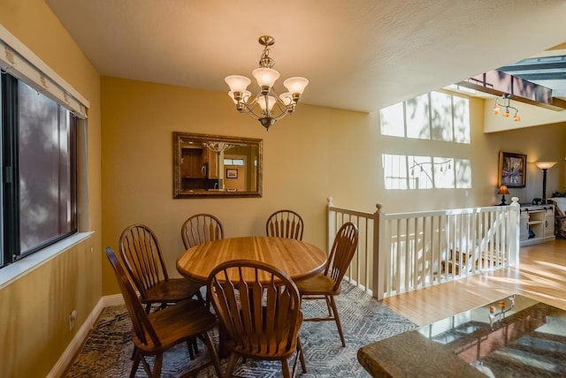 dining area with a chandelier