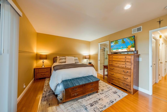 bedroom with light wood-type flooring