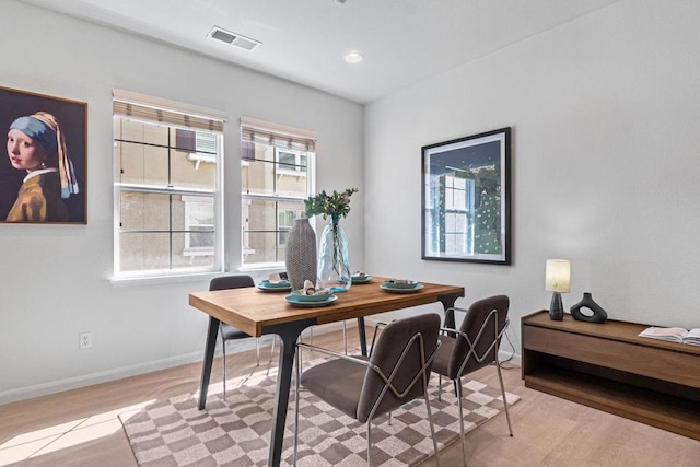 office area with light hardwood / wood-style flooring