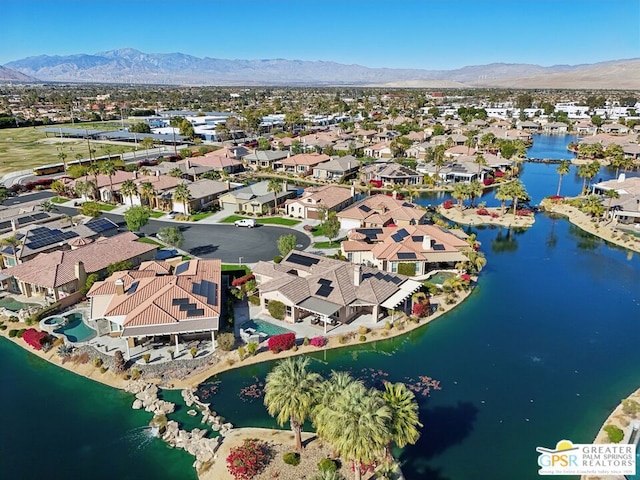 bird's eye view featuring a water and mountain view