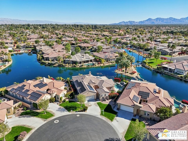 aerial view with a water and mountain view