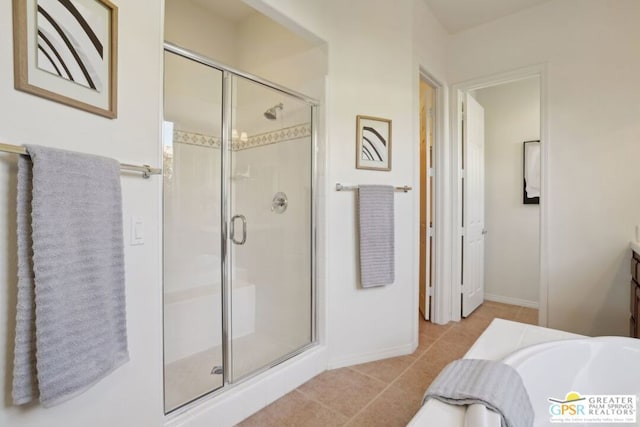 bathroom with vanity, tile patterned flooring, and independent shower and bath