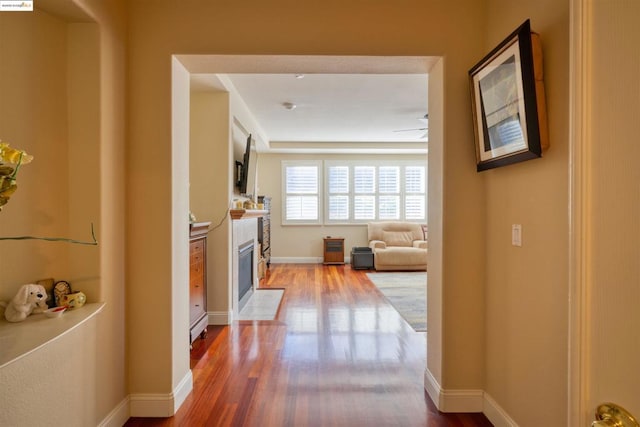 hallway featuring hardwood / wood-style flooring