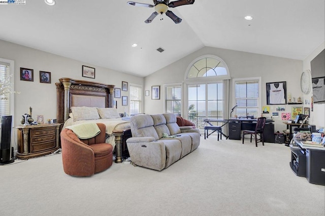 bedroom with carpet floors, multiple windows, lofted ceiling, and ceiling fan