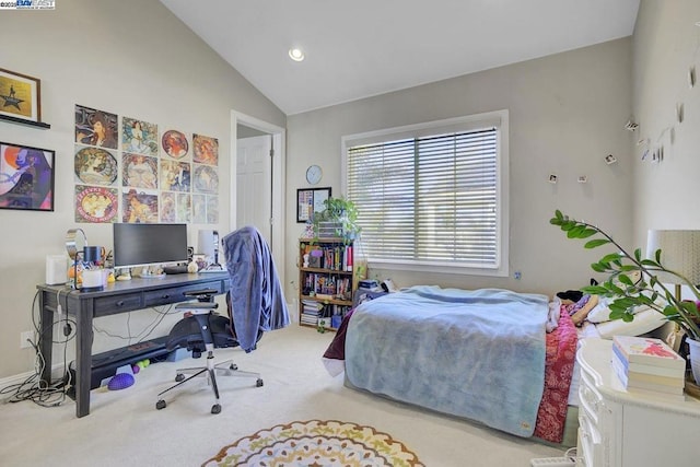 carpeted bedroom featuring lofted ceiling