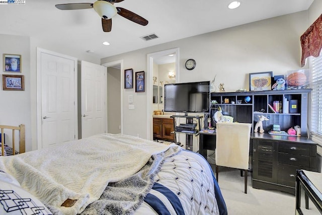 bedroom with ceiling fan and ensuite bathroom