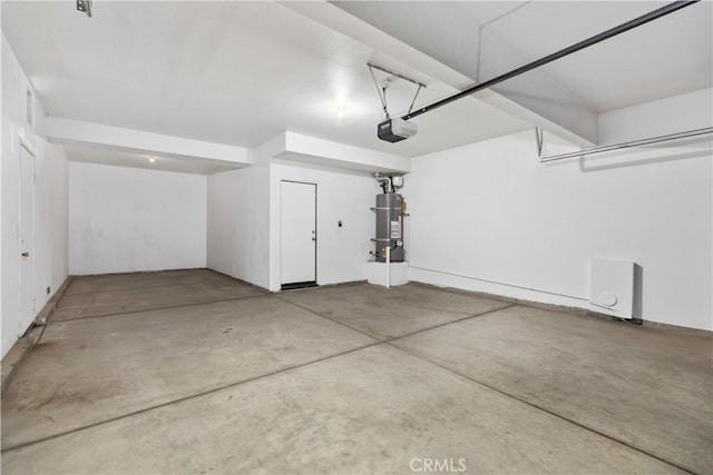 garage with a garage door opener and water heater