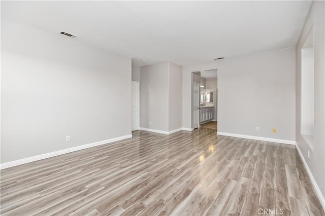 empty room featuring light hardwood / wood-style flooring