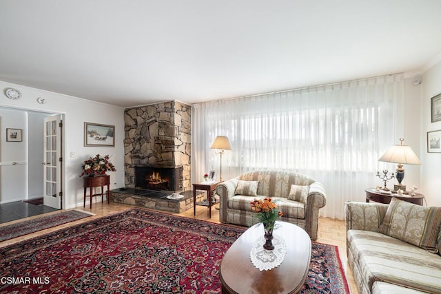 living room featuring a fireplace