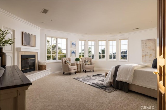 bedroom with crown molding and carpet flooring