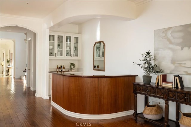 interior space featuring indoor bar