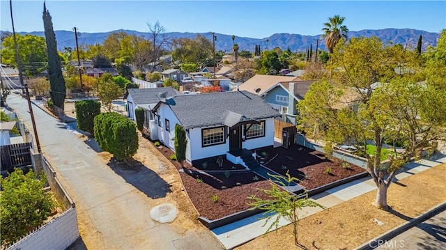 birds eye view of property featuring a mountain view