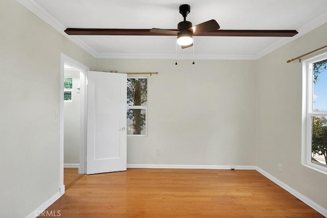 unfurnished room featuring ceiling fan, crown molding, and light hardwood / wood-style floors