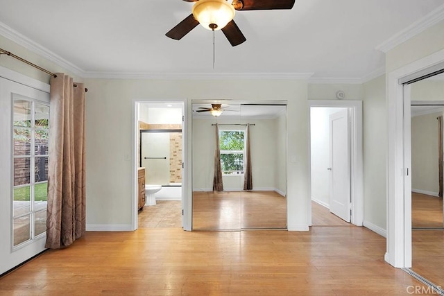 spare room featuring ceiling fan, ornamental molding, and light hardwood / wood-style flooring