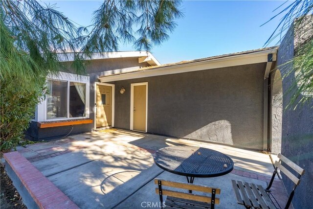 rear view of property with a patio