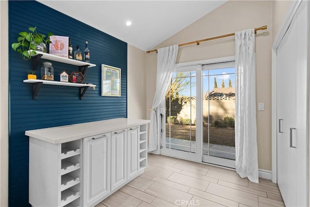 doorway with vaulted ceiling