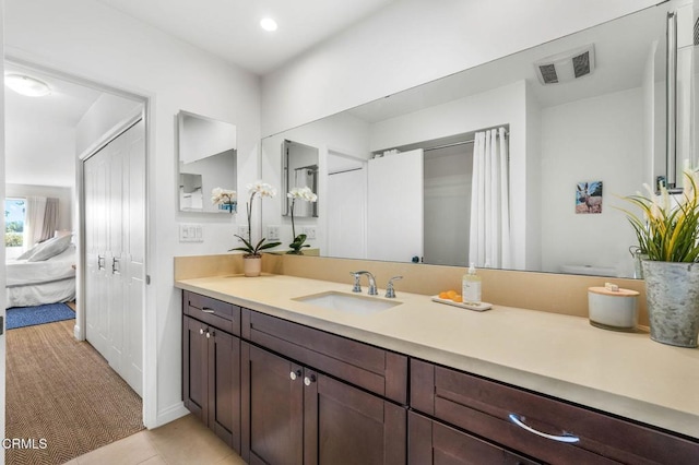 bathroom featuring vanity and tile patterned floors