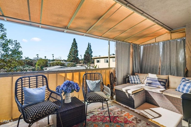 view of patio / terrace featuring a balcony and an outdoor hangout area