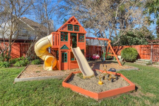 view of jungle gym with a fenced backyard and a yard