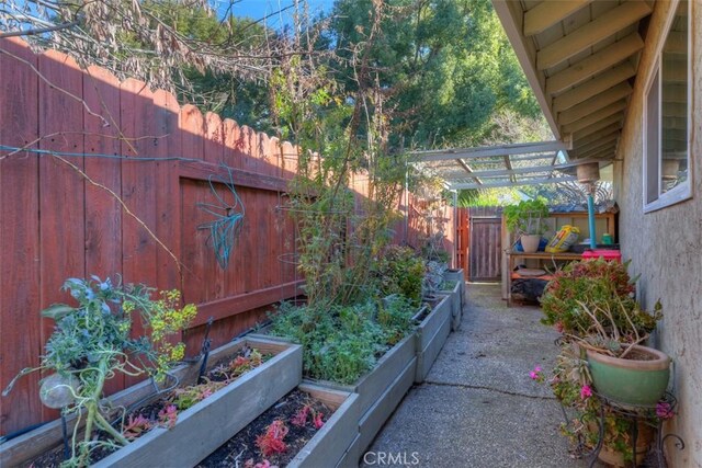 view of home's exterior featuring a pergola