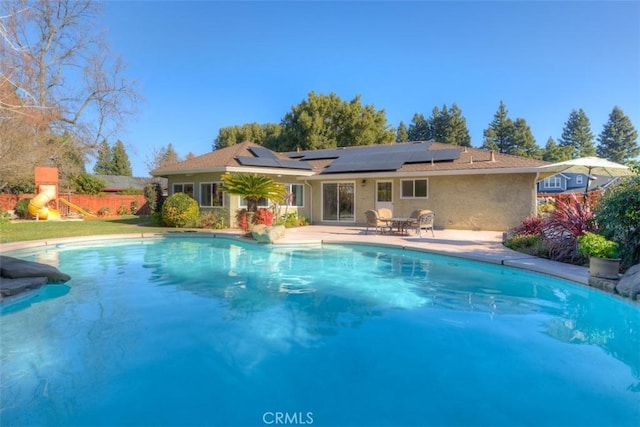 pool featuring a patio area