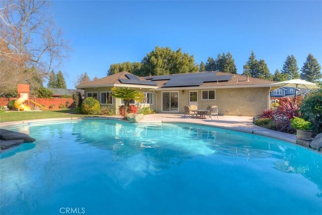 pool featuring a patio