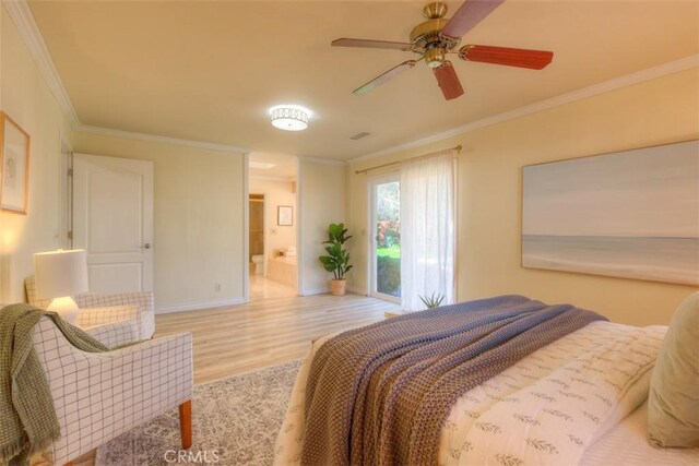 bedroom featuring ceiling fan, crown molding, ensuite bath, and light wood-type flooring