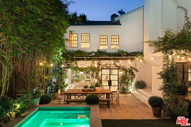 rear view of house featuring a patio area