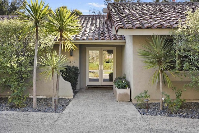 property entrance featuring french doors