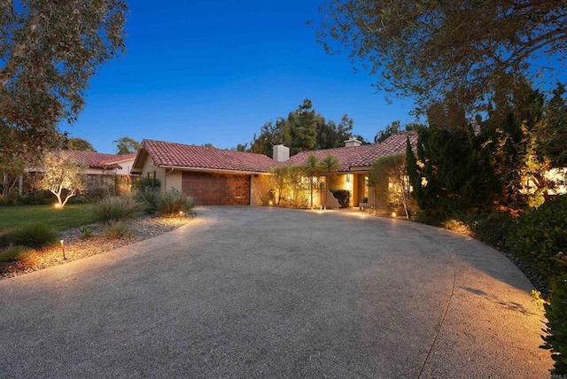 view of front of property with a garage