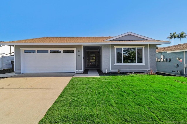 single story home featuring a front yard and a garage