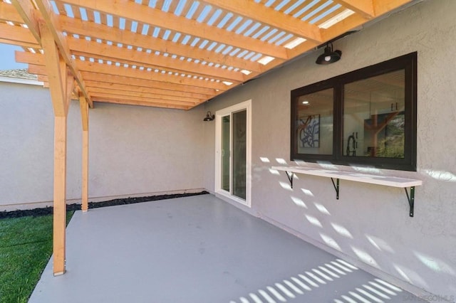 view of patio featuring a pergola