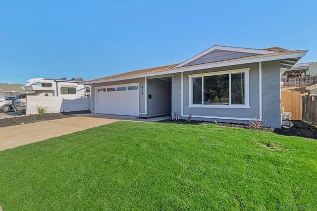 single story home with a front lawn and a garage