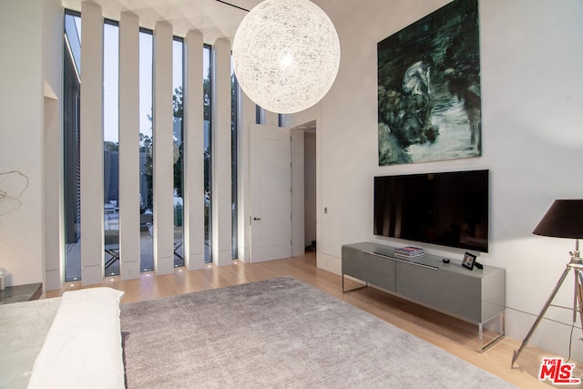 living room featuring hardwood / wood-style floors and floor to ceiling windows