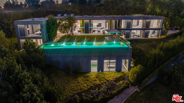 rear view of house featuring a patio area