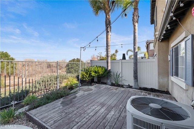 wooden deck with central AC unit