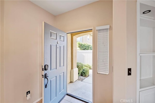 view of tiled foyer entrance