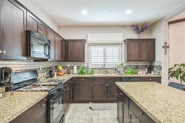 33312 Hitching Post Dr, Winchester, CA 92596 - kitchen featuring black appliances, a sink, dark brown cabinets, light stone countertops, and recessed lighting
