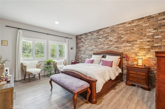 33312 Hitching Post Dr, Winchester, CA 92596 - bedroom with light wood-type flooring and brick wall